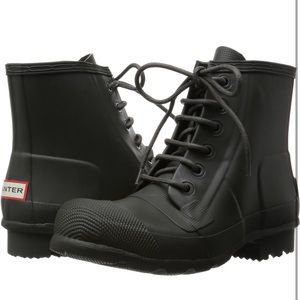 Brand new Hunter (brogue style )rain boots. Men’s size 8 1/2.. unworn.